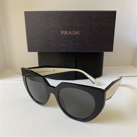 prada black and white glasses|Prada glasses prices.